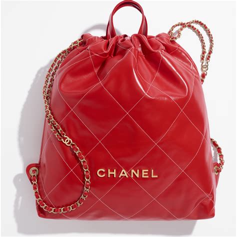 chanel calfskin backpack embellished with a cc signature|Chanel classic calfskin flap bag.